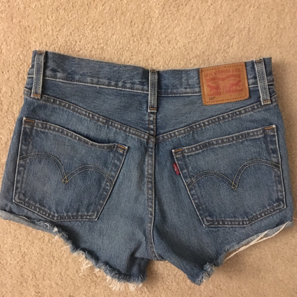 Levi’s High Waisted Button Up Medium Wash Shorts